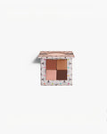 BROCK CHARLOTTE BIO 4-shade eyeshadow palette with matte and metallic brown, gold, and beige powder pigments.