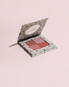 BROCK Charlotte Bio eyeshadow palette with four velvet powder shades in a patterned compact case.