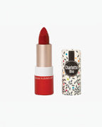BROCK Charlotte Bio matte lipstick in deep red with a patterned floral cap and natural organic ingredients.