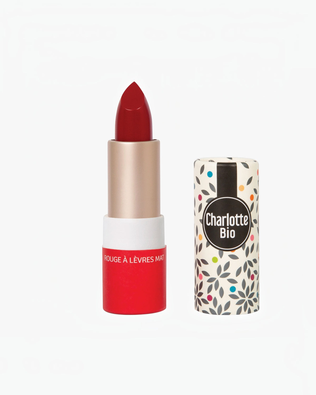 BROCK Charlotte Bio matte lipstick in deep red with a patterned cardboard tube and gold base