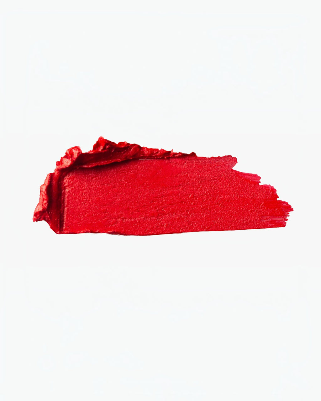 BROCK Charlotte Bio matte lipstick swatch in a vibrant red shade with a creamy, pigmented texture.