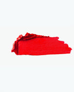 BROCK Charlotte Bio matte lipstick swatch in a vibrant red shade with a creamy, pigmented texture.