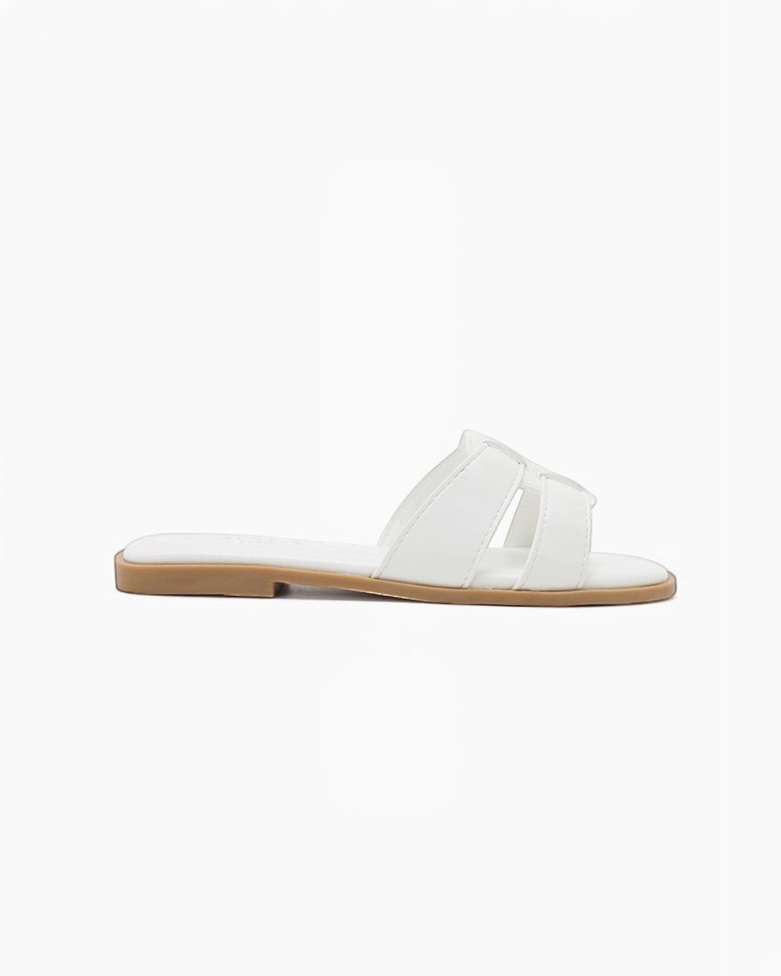 Claquette plate blanche JOIA PARIS en cuir synthétique avec bride découpée, talon plat.