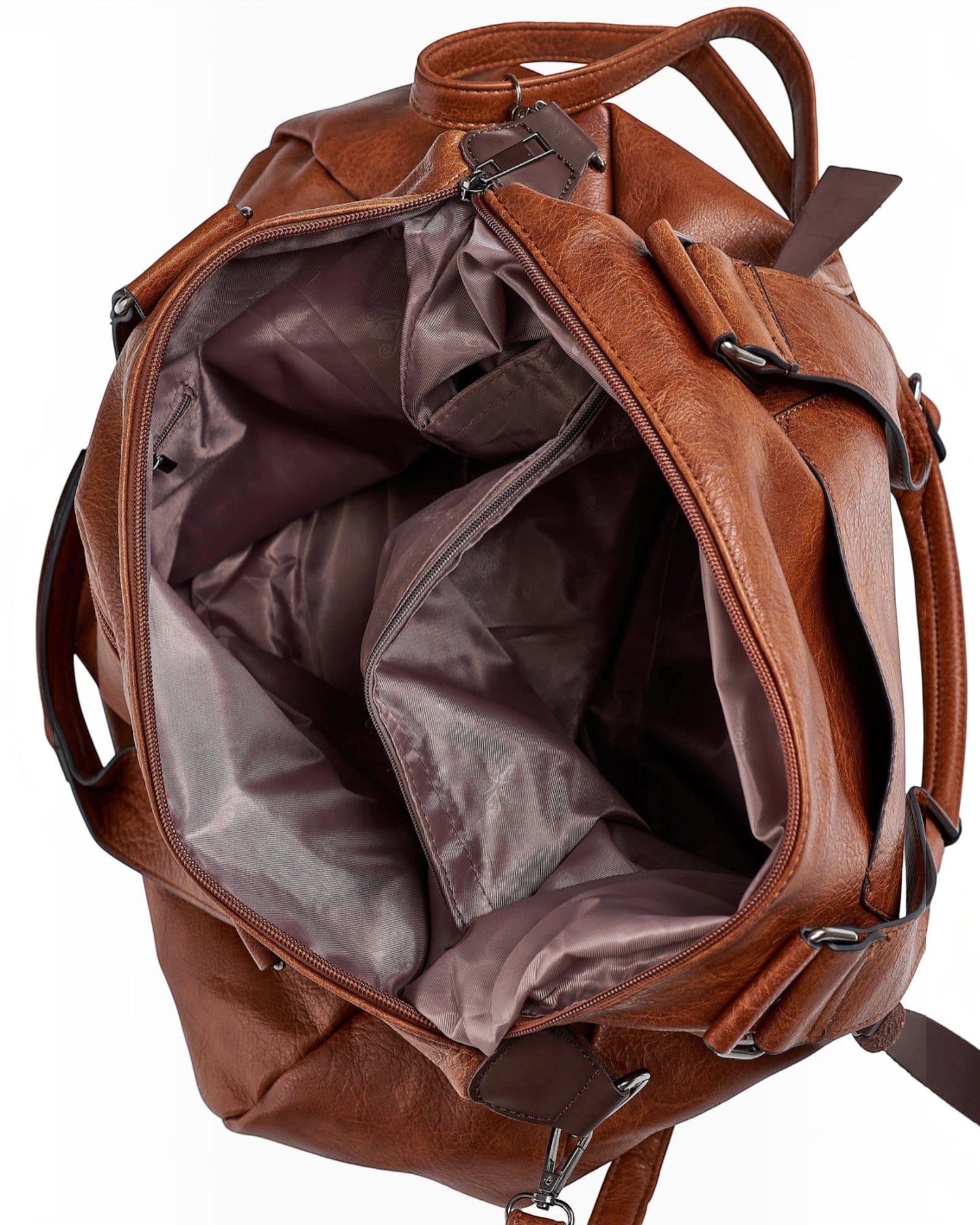 BROCK COLMA cognac faux leather tote bag with open spacious interior, zippered pockets, and sturdy handles.