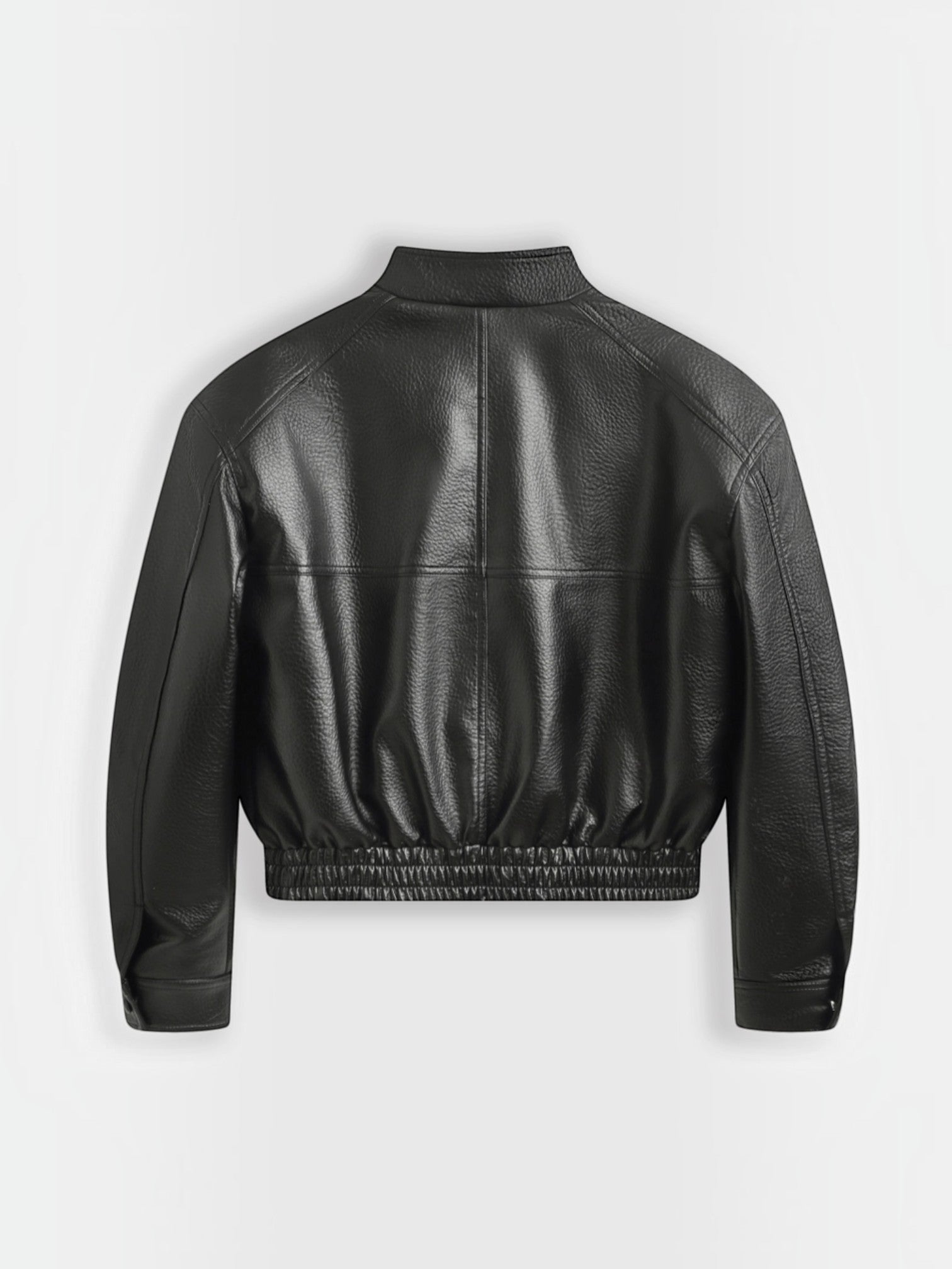 Back view of a black Copperose faux leather cropped jacket with a stand collar and elasticated hem by BROCK