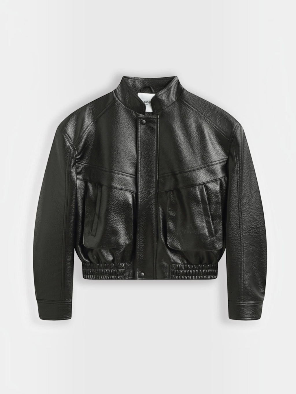 BROCK Copperose black faux leather cropped jacket with structured shoulders, mandarin collar, and flap pockets.