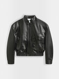 BROCK Copperose black faux leather cropped jacket with structured shoulders, mandarin collar, and flap pockets.