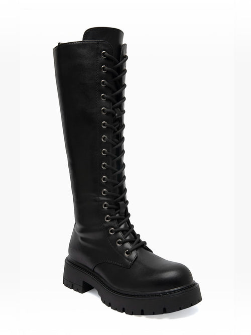 BROCK ERYNN black knee-high lace-up boots with metal eyelets and a thick lug sole for a rock-inspired winter look.