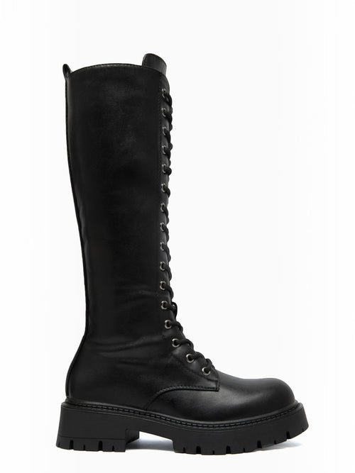 BROCK ERYNN black knee-high lace-up boots with metal eyelets and a thick lug sole for a rock-inspired winter look.