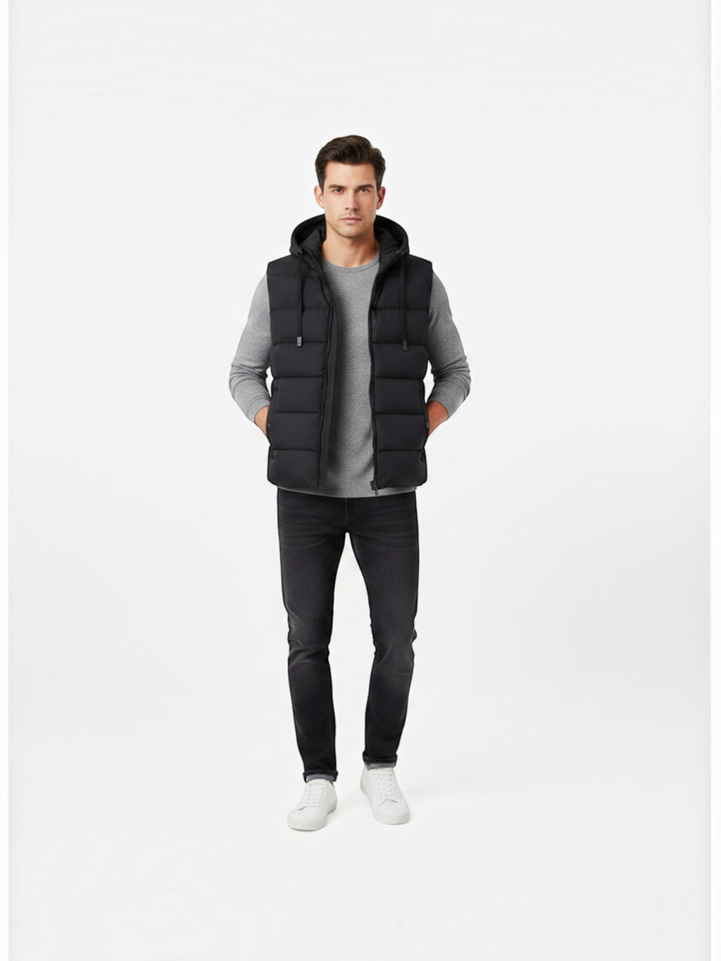 BROCK FIVE EVER black quilted hooded vest worn by a man with a grey sweater and black jeans
