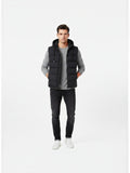 BROCK FIVE EVER black quilted hooded vest worn by a man with a grey sweater and black jeans