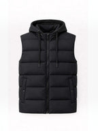 BROCK FIVE EVER black quilted sleeveless puffer vest with a detachable hood, zip closure, and snap-button pockets.