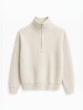 BROCK FIVE EVER cream ribbed knit sweater for men featuring a high collar with a silver half-zip and raglan sleeves.