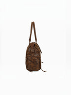 BROCK GALLANTRY Le Vespera A4 bowling bag in brown distressed synthetic leather with side view and top handles.