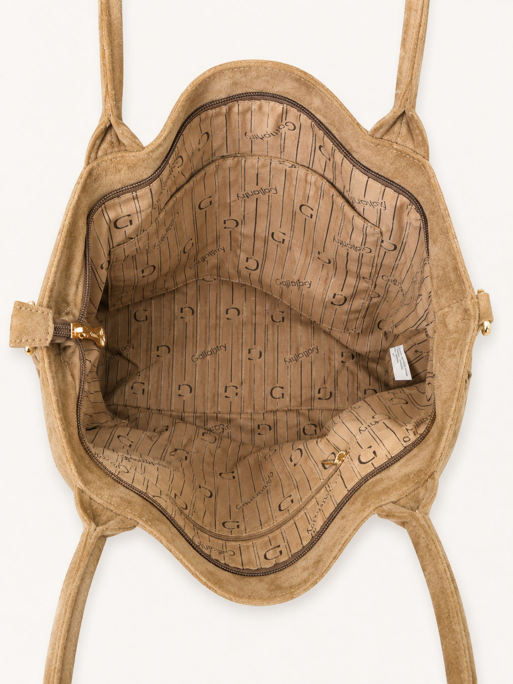 Interior view of a BROCK GALLANTRY beige synthetic suede handbag with branded lining and gold zipper details.