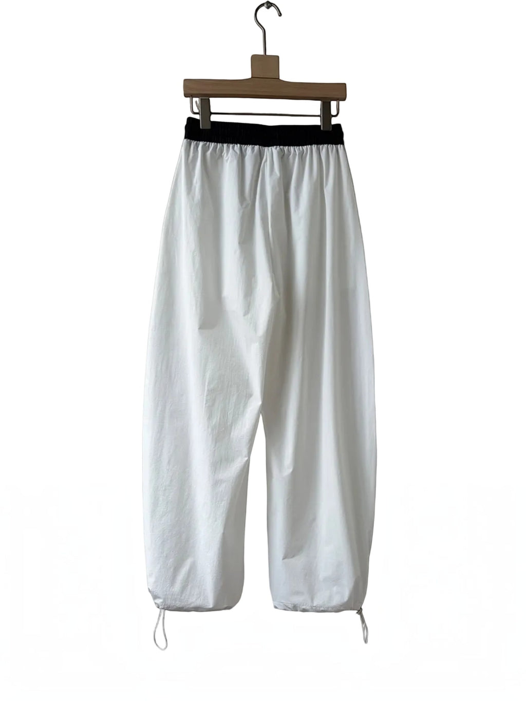 BROCK Golden days white wide-leg viscose trousers with a black elastic waistband and adjustable leg cuffs.