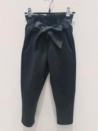 BROCK GRASSTAR children's black trousers with a high paperbag waist, tie belt, and comfortable stretch fabric.