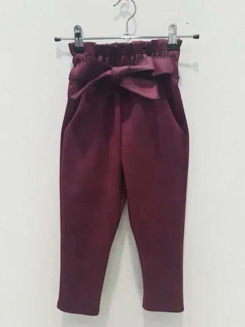 BROCK GRASSTAR children's burgundy trousers with a high paperbag waist, tie belt, and comfortable stretch fit.