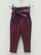 BROCK GRASSTAR children's burgundy trousers with a high paperbag waist, tie belt, and comfortable stretch fit.