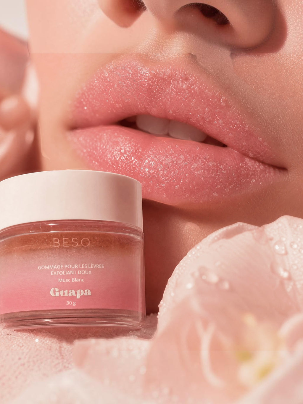 BROCK GUAPA white musk gentle lip scrub in a glass jar with sugar texture applied on model lips