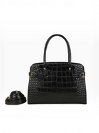 BROCK INES DELAURE black faux leather handbag with crocodile texture, top handles, and detachable shoulder strap.