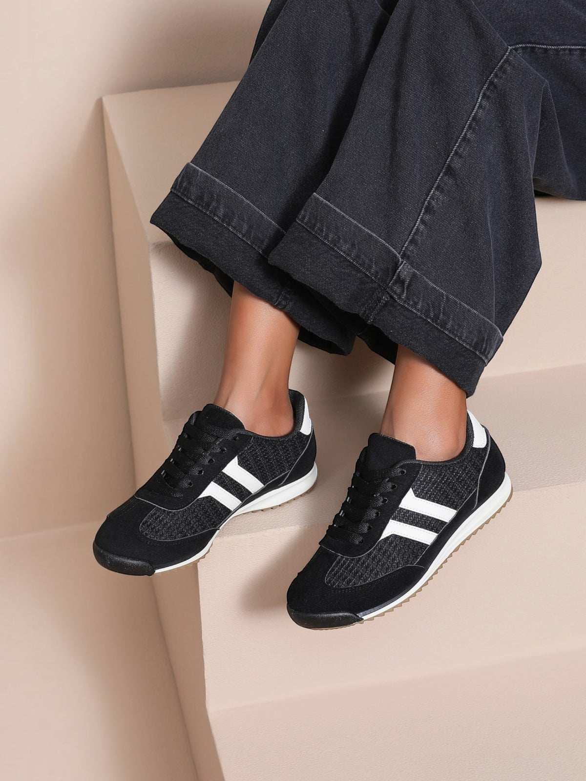 BROCK JOIA low-top sneakers in black synthetic material with white contrast stripes and a textured sole