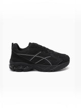 BROCK JOIA women's black running-style sneakers with mesh, synthetic suede, and thick cushioned soles.