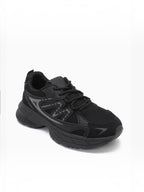 BROCK JOIA women's black sport chic sneakers with breathable mesh, synthetic overlays, and a thick cushioned sole.