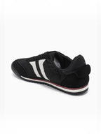 BROCK JOIA vintage running sneakers in black with white side stripes and a comfortable cushioned sole