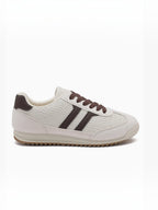 BROCK JOIA low-top sneakers in off-white with brown contrast panels, lace-up closure, and a textured rubber sole.