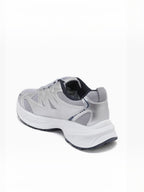 BROCK JOIA women's silver sport chic sneakers with breathable mesh, synthetic overlays, and a thick white sole.
