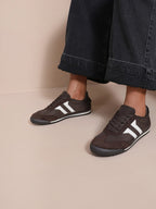 BROCK JOIA vintage style running sneakers in dark brown suede and fabric with white side stripes on a model