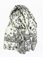 BROCK LINETA lightweight wool-blend scarf in cream with a black and grey bohemian bandana paisley print and fringes.