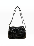 BROCK LOUISA LEE croissant-shaped black metallic leather shoulder bag with a ruched design and adjustable strap.