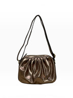 BROCK LOUISA LEE metallic croissant crossbody bag in gathered cowhide leather with an adjustable strap.