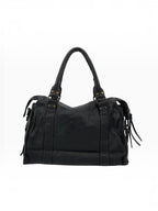 BROCK LOUISA LEE Capucine L vintage black cowhide leather handbag with braided handles, fringe, and stud details.