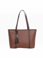 BROCK MIA LAROUGE brown structured shoulder bag with tassel detail and adjustable straps for students