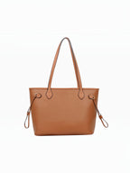 BROCK MIA LAROUGE tan leather shoulder bag with adjustable side straps and a clean minimalist design