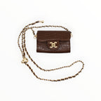 BROCK mini brown faux crocodile crossbody bag with gold chain strap and C.Clo logo hardware
