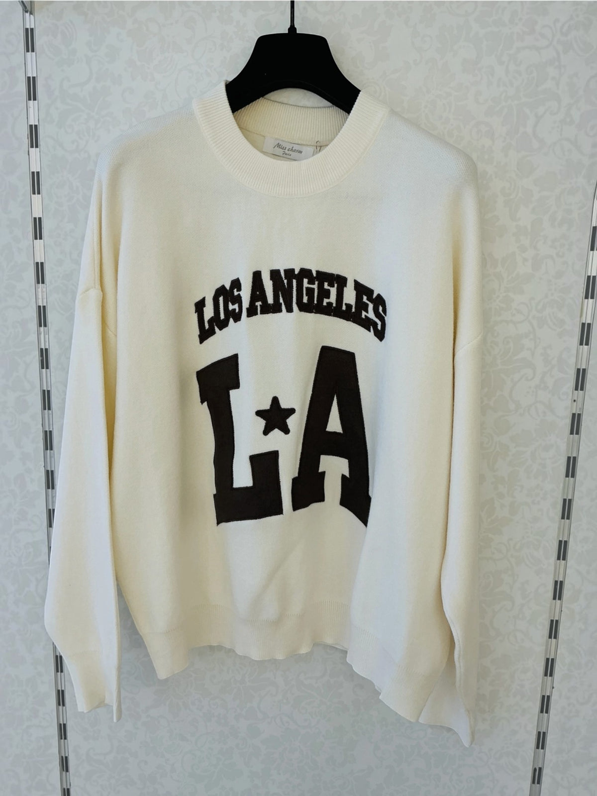 BROCK MISS CHARM beige cotton knit sweater with black Los Angeles LA varsity style graphic print and round neck