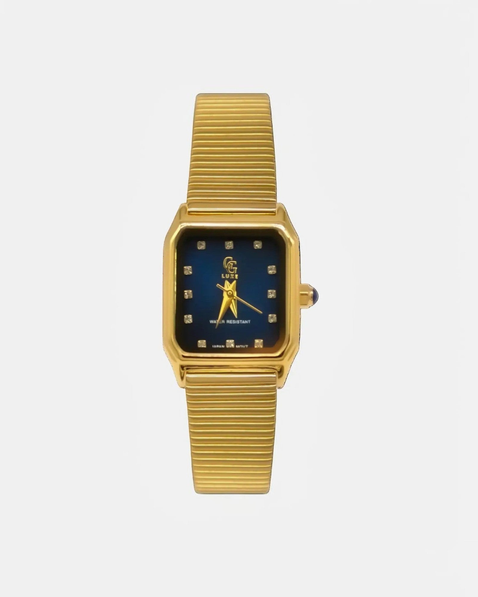 Montre Marlow GG LUXE WATCH dorée, cadran bleu rectangulaire avec index cristaux et bracelet mesh.