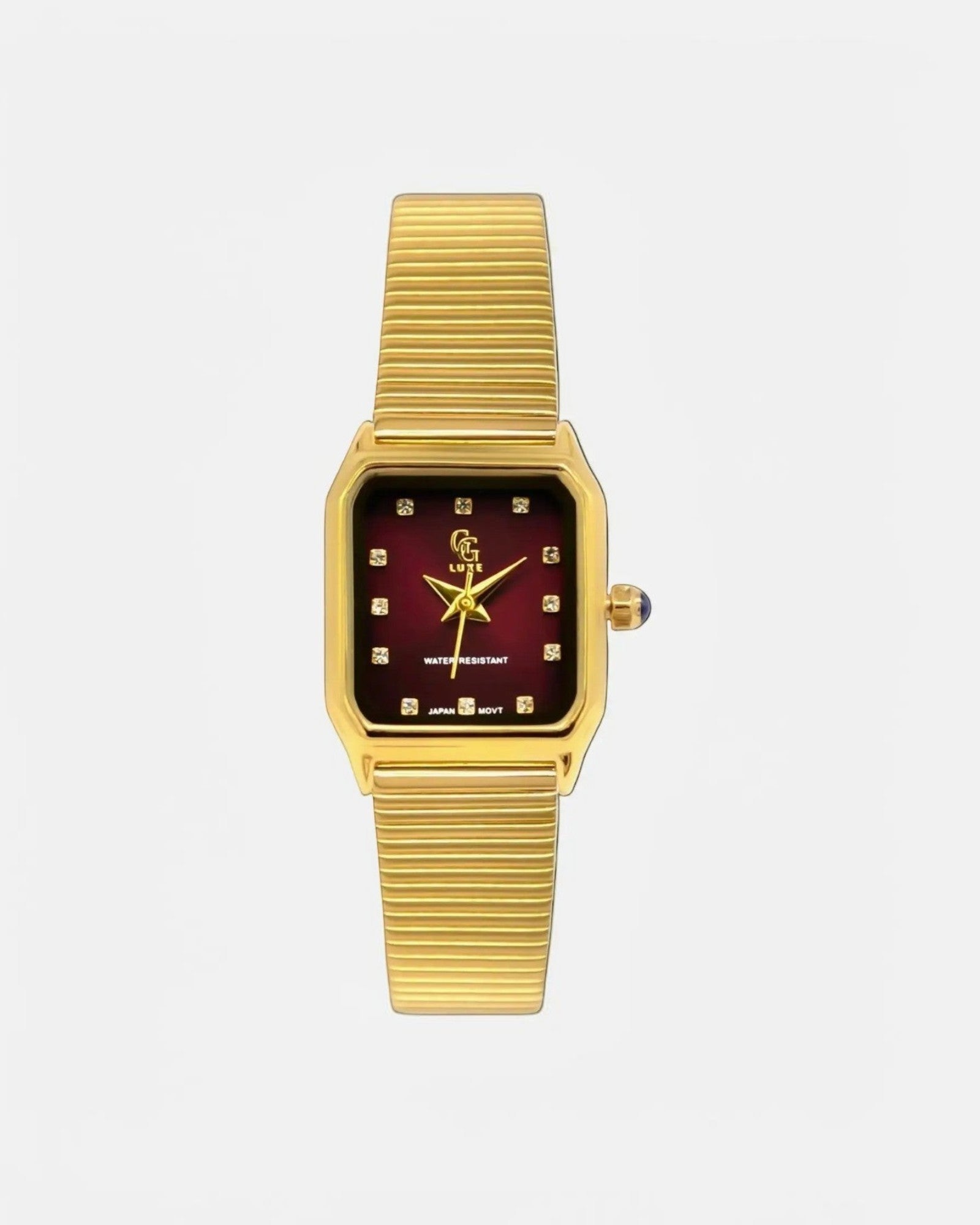 Montre Marlow GG LUXE WATCH dorée avec cadran rectangulaire bordeaux, index cristaux et bracelet mesh.