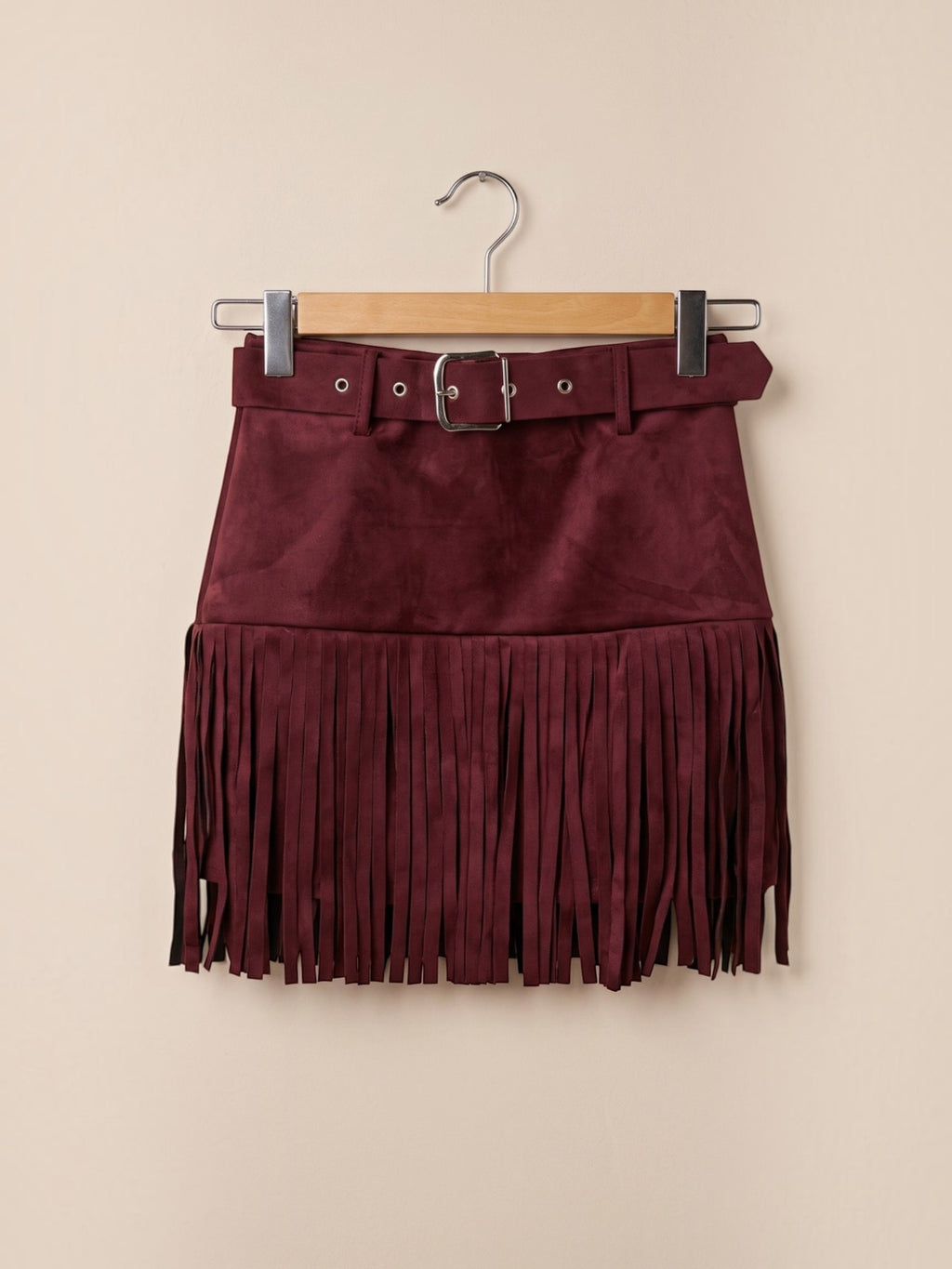 BROCK MOOYA burgundy faux suede mini skirt with fringe hem and matching belt featuring a silver metal buckle