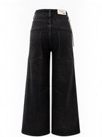BROCK R.DISPLAY Lyana black stretch denim jeans with wide leg cut and back pockets, viewed from behind.