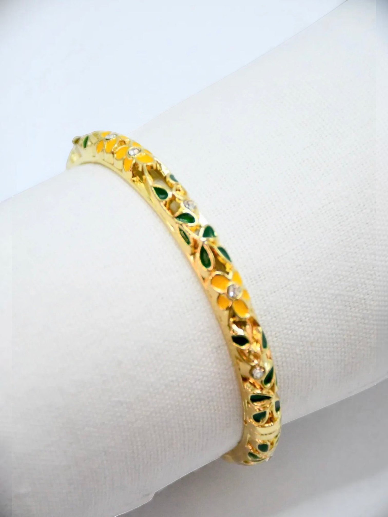 BROCK ROSA Thai-inspired gold brass bangle bracelet with yellow and green floral enamel and crystal accents