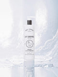 BROCK S2Z COSMETICS organic donkey milk moisturizing body lotion in a 250ml pump bottle on a textured white surface.