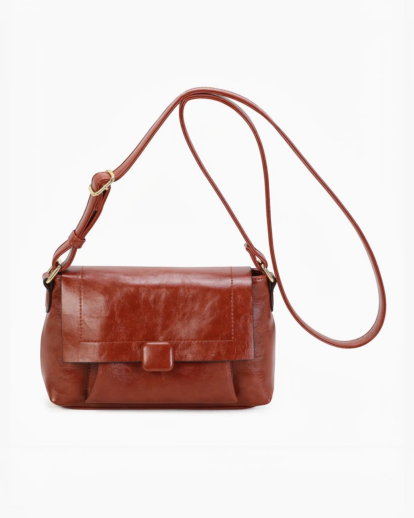 Sac bandoulière marron en PU INES DELAURE avec fermeture zippée et rabat, idéal pour un usage quotidien.