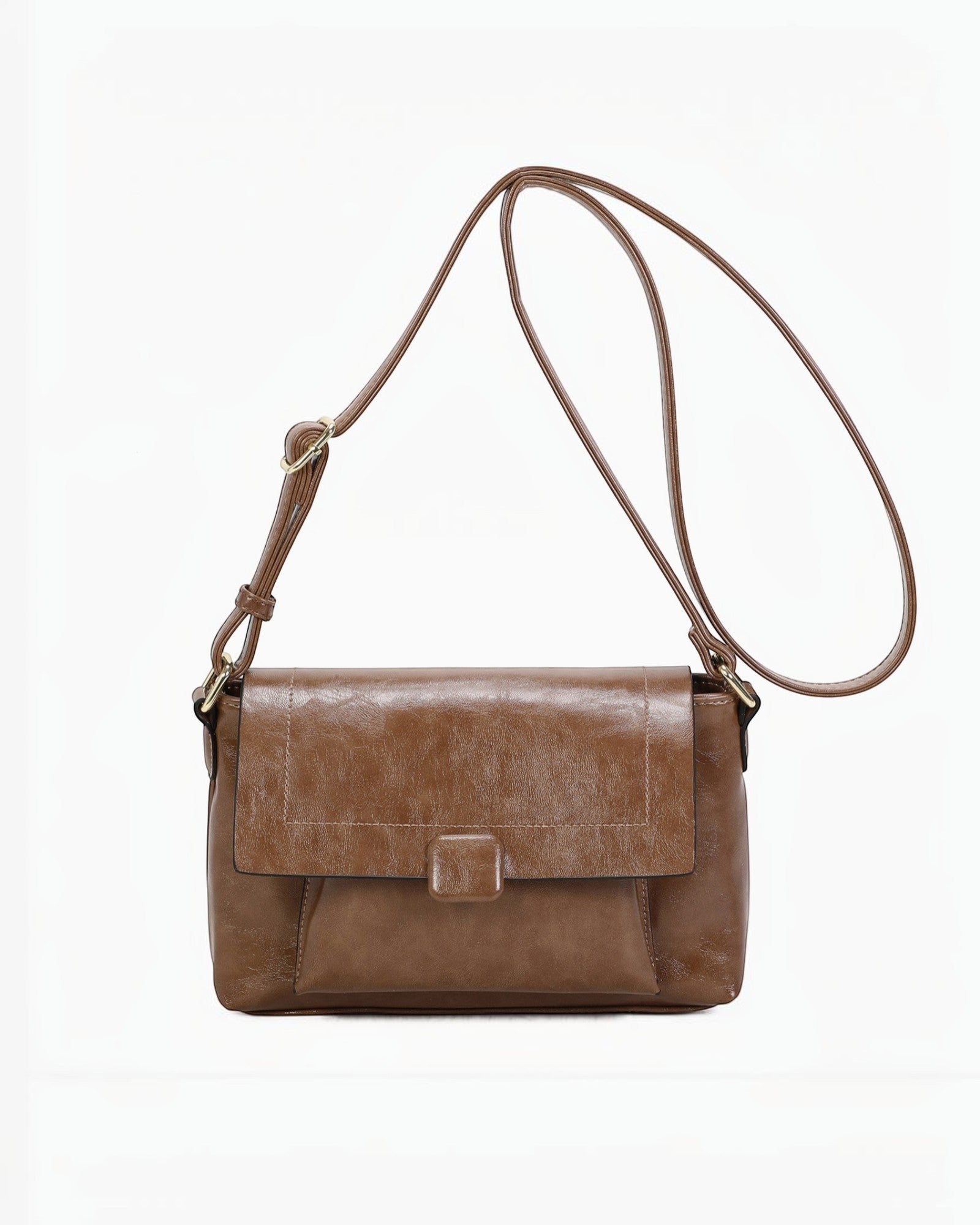 Sac bandoulière marron en PU INES DELAURE zippé à rabat avec poche extérieure et bandoulière réglable.
