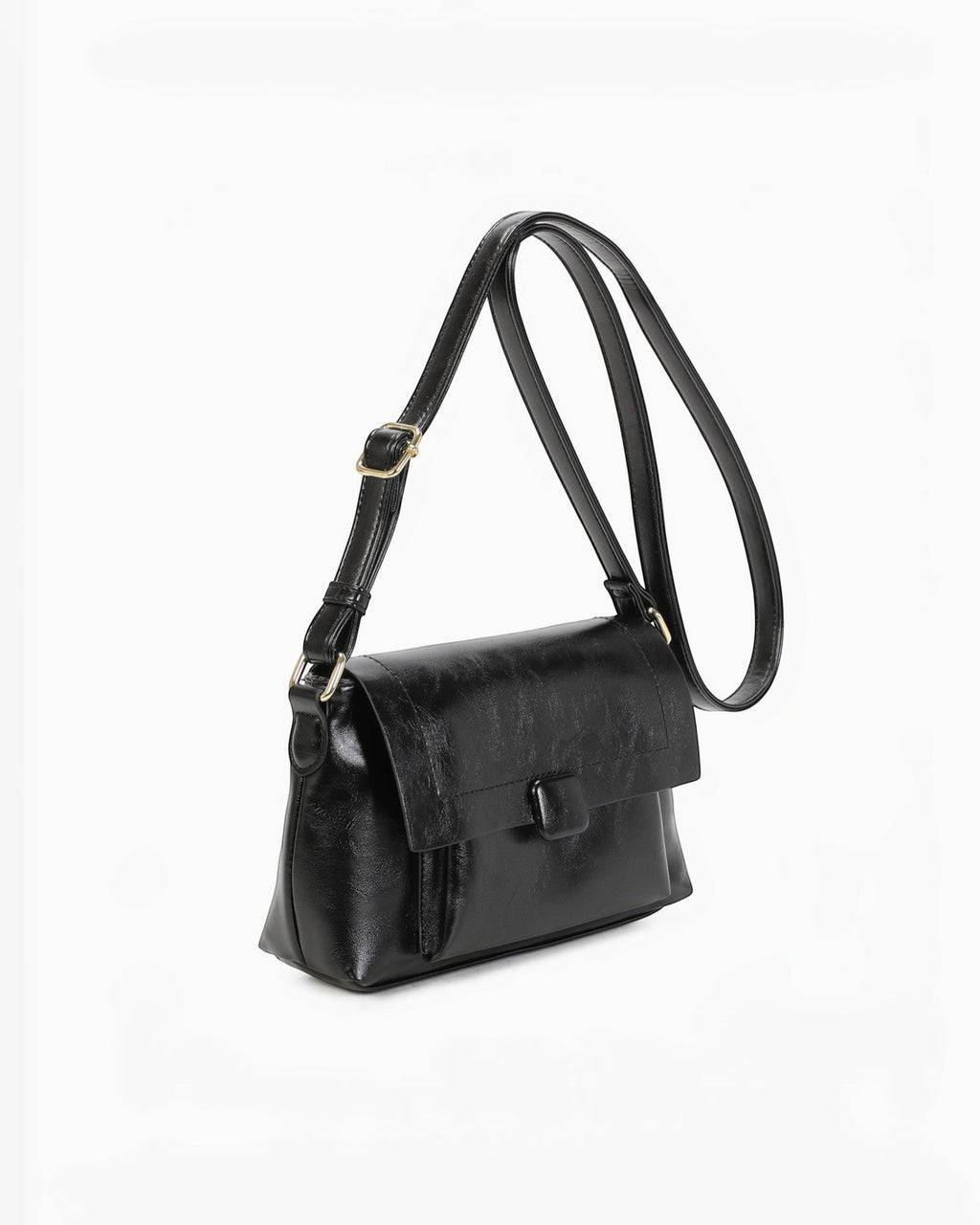 Sac bandoulière noir en PU INES DELAURE avec fermeture zippée et rabat, idéal pour un usage quotidien.