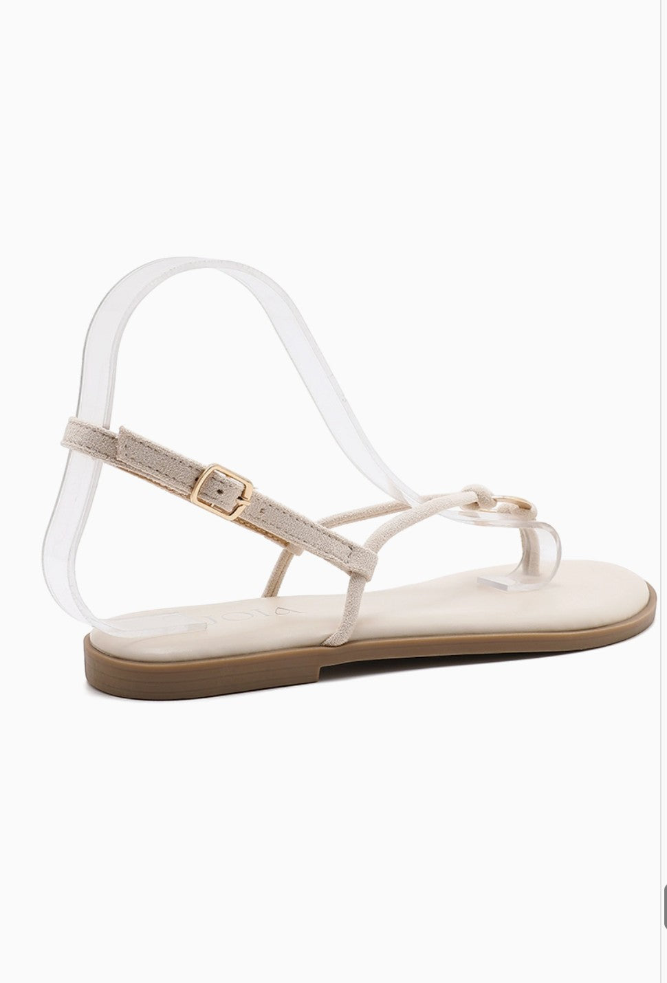 BROCK Sandale plate JOIA beige en tissu avec bride cheville réglable et bijou central. Style minimaliste et féminin.